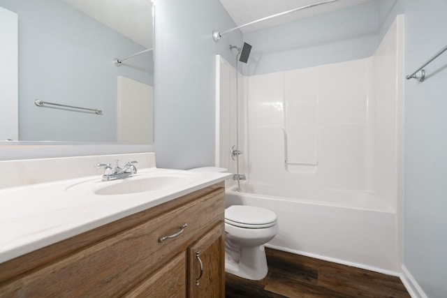 6241 Eskew Dr, Columbia, TN 38401 - full bath with wood finished floors, vanity, toilet, and shower / bathtub combination