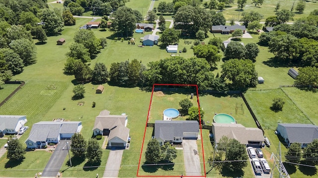 6241 Eskew Dr, Columbia, TN 38401 - aerial view of property and surrounding area with property parcel outlined and a pool area