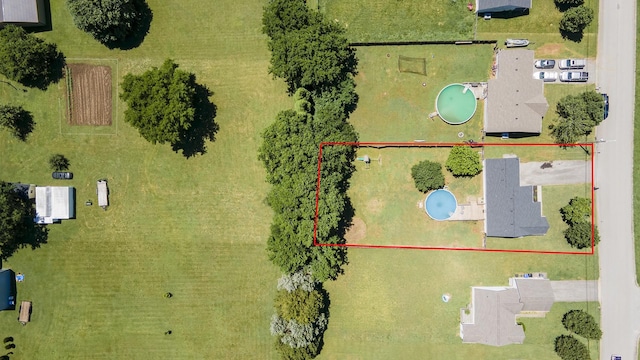 6241 Eskew Dr, Columbia, TN 38401 - aerial view of property and surrounding area with property parcel outlined and a pool area
