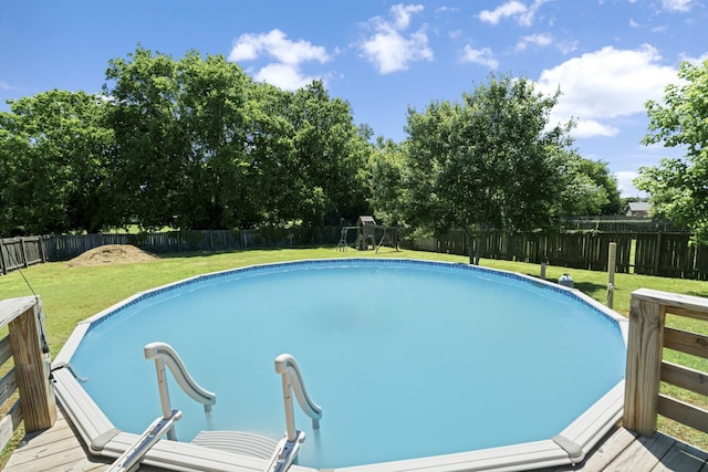 6241 Eskew Dr, Columbia, TN 38401 - view of pool with a wooden deck and a playground