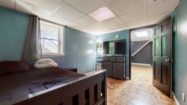 340 Jackson Rd, Clarksville, TN 37042 - bedroom featuring baseboards and a paneled ceiling