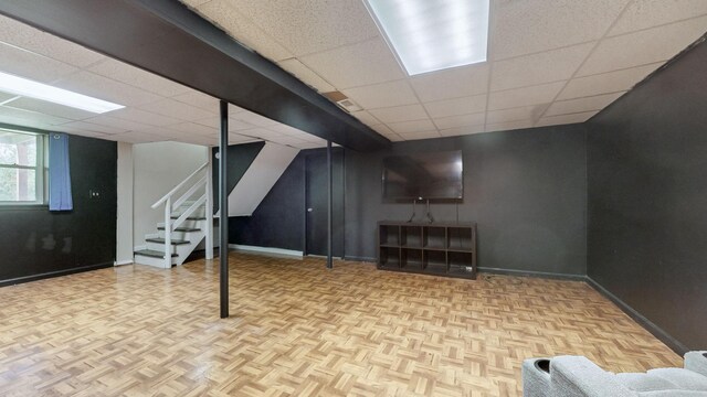 340 Jackson Rd, Clarksville, TN 37042 - basement with stairway, baseboards, and a paneled ceiling