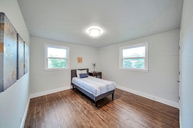 210 NW Clearview Dr, Mount Juliet, TN 37122 - bedroom with baseboards, visible vents, and wood finished floors