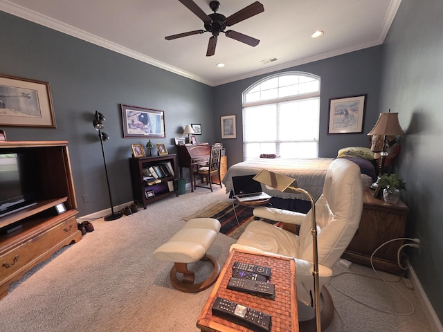 bedroom featuring carpet floors, ornamental molding, baseboards, and visible vents