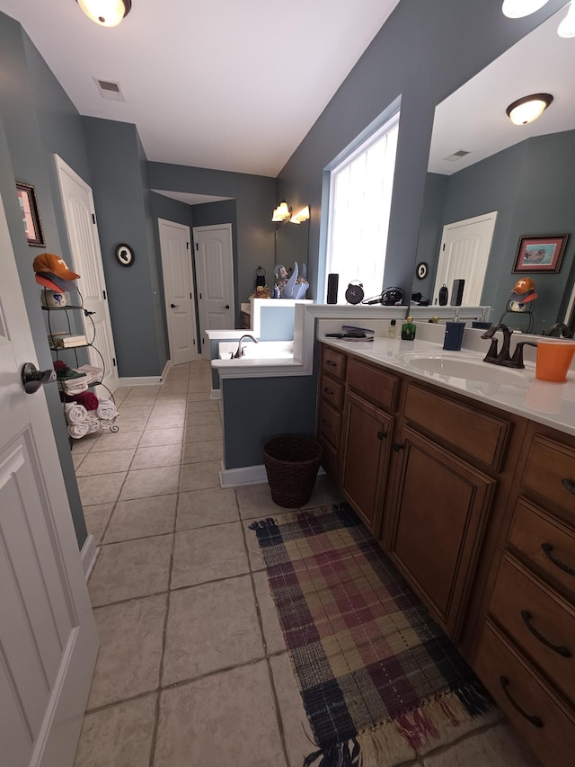 full bathroom with visible vents, tile patterned flooring, and vanity