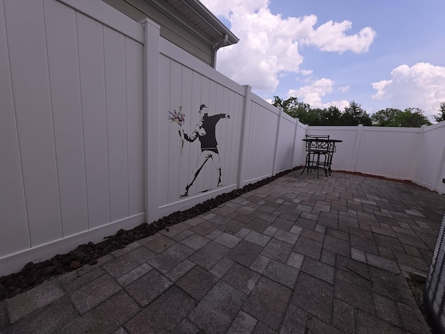 view of patio with a fenced backyard