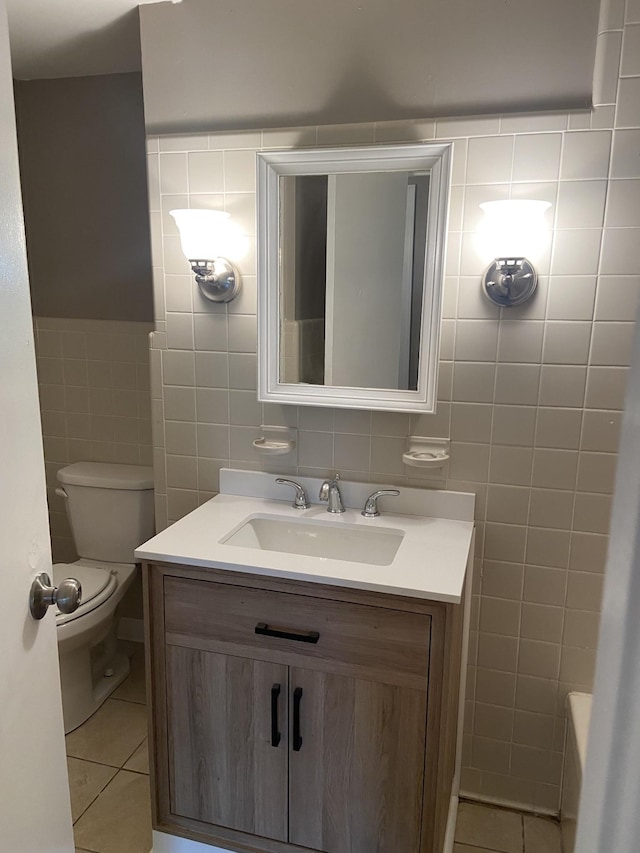 11495 Guthrie Rd, Guthrie, KY 42234 - full bathroom with vanity, toilet, tile walls, walk in shower, and tile patterned floors