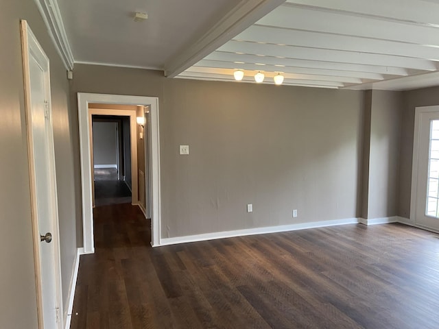 11495 Guthrie Rd, Guthrie, KY 42234 - unfurnished room featuring dark wood-style flooring, baseboards, and beam ceiling