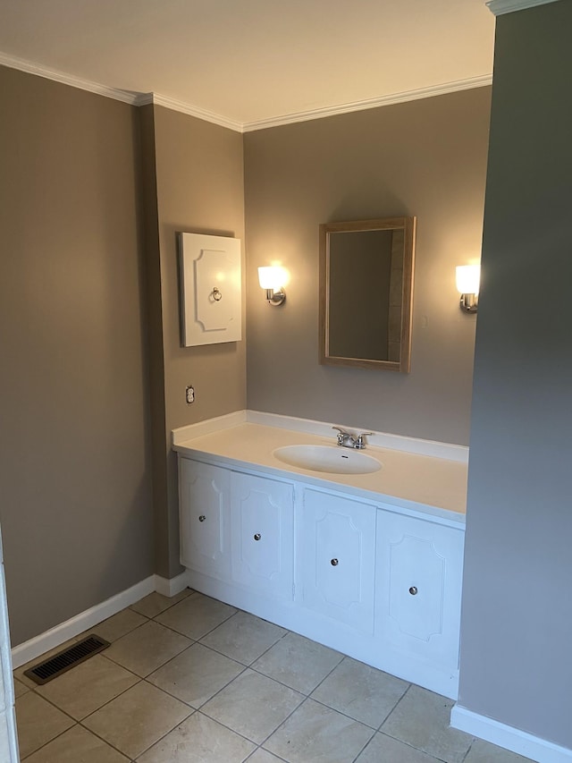 11495 Guthrie Rd, Guthrie, KY 42234 - bathroom with crown molding, vanity, tile patterned floors, baseboards, and visible vents