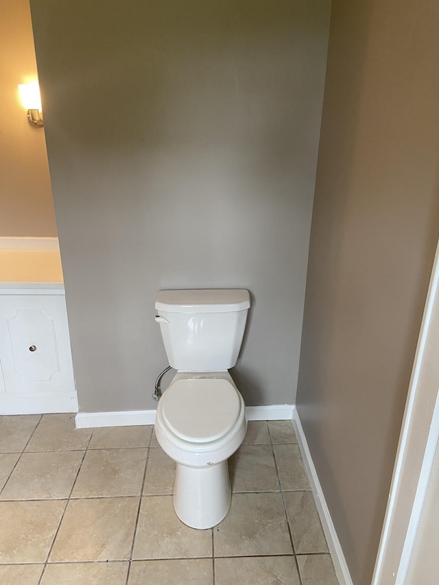 11495 Guthrie Rd, Guthrie, KY 42234 - bathroom with baseboards, tile patterned flooring, and toilet