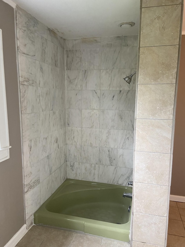 11495 Guthrie Rd, Guthrie, KY 42234 - bathroom with baseboards, shower / bath combination, and tile patterned floors