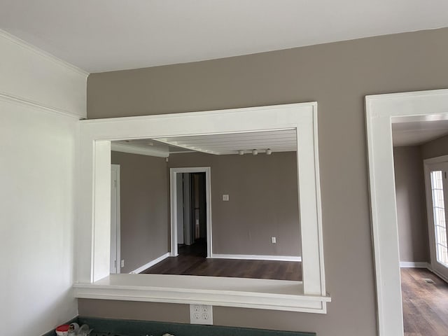 11495 Guthrie Rd, Guthrie, KY 42234 - unfurnished room with baseboards and wood finished floors