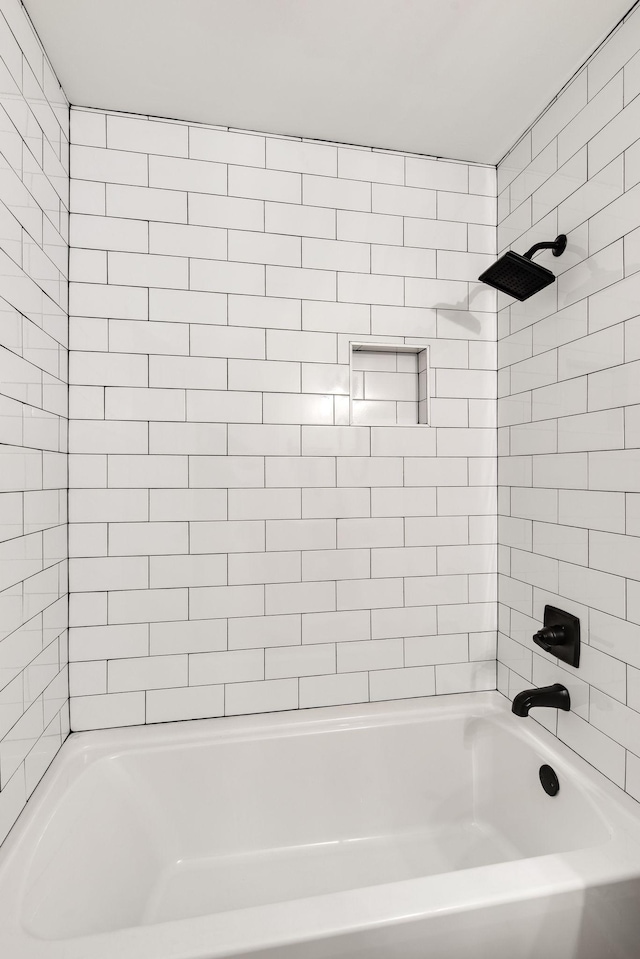 full bathroom with bathing tub / shower combination