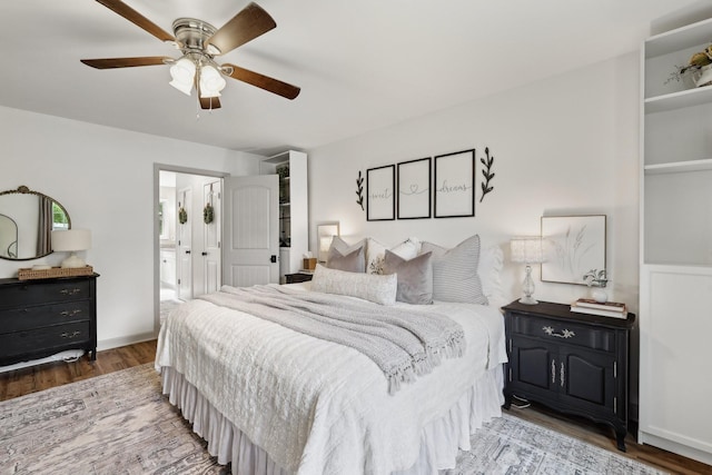 557 Skyview Dr, Ashland City, TN 37015 - bedroom featuring ceiling fan, ensuite bath, and wood finished floors