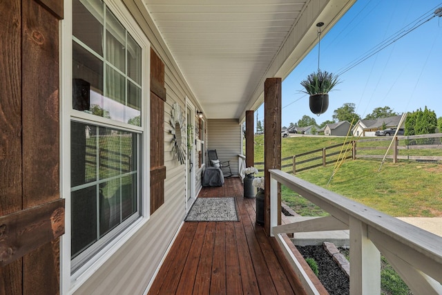 557 Skyview Dr, Ashland City, TN 37015 - wooden deck with fence, covered porch, and a yard