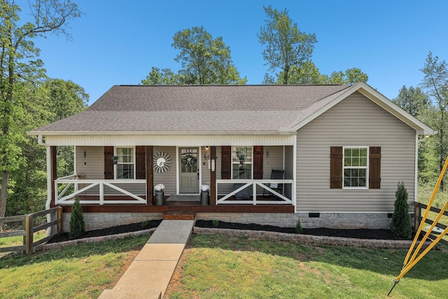 557 Skyview Dr, Ashland City, TN 37015 - view of front of property featuring roof with shingles, fence, covered porch, and crawl space