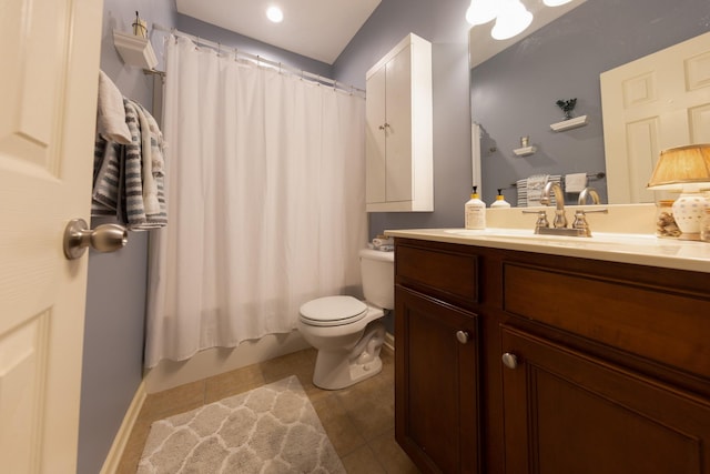 bathroom with tile patterned flooring, shower / bath combo with shower curtain, toilet, and vanity
