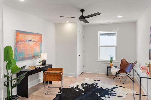 home office with a ceiling fan, baseboards, recessed lighting, and light wood-type flooring