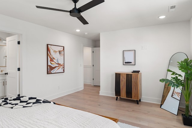bedroom with recessed lighting, baseboards, visible vents, and light wood finished floors