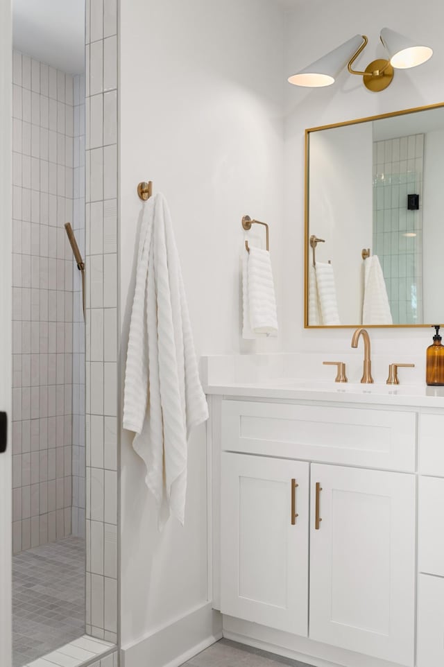 full bathroom featuring vanity and a walk in shower