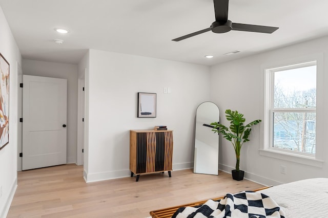 unfurnished bedroom featuring visible vents, light wood-style floors, baseboards, ceiling fan, and recessed lighting