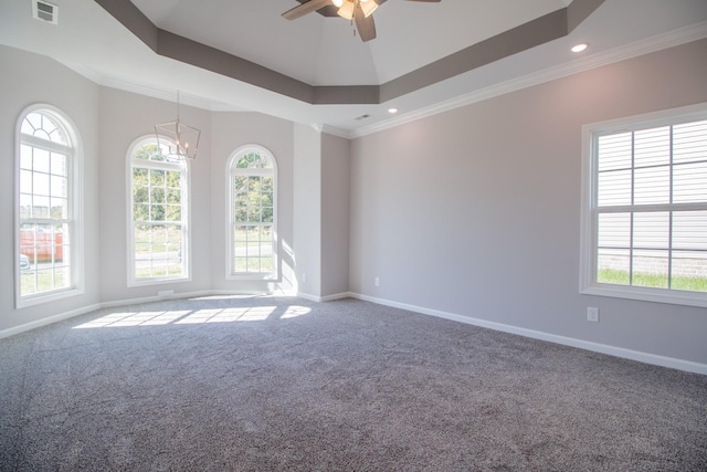 empty room featuring visible vents, carpet floors, baseboards, ceiling fan with notable chandelier, and ornamental molding