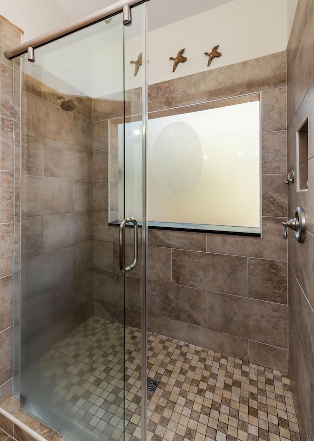 bathroom with a stall shower