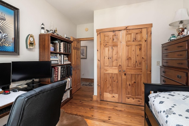 bedroom with light wood-style floors