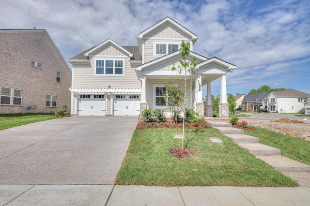 4025 Singing Creek Dr, Franklin, TN 37064 - craftsman-style home with a garage, a front lawn, board and batten siding, and driveway