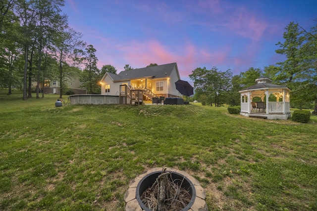 view of yard with a gazebo and a deck