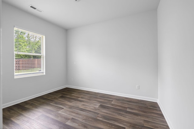 3021 Posada Ct, Spring Hill, TN 37174 - unfurnished room featuring visible vents, baseboards, and dark wood-style floors