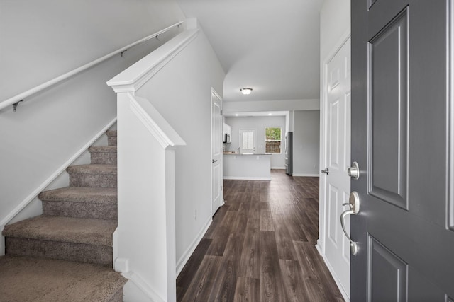 3021 Posada Ct, Spring Hill, TN 37174 - foyer featuring dark wood-style flooring, baseboards, and stairway
