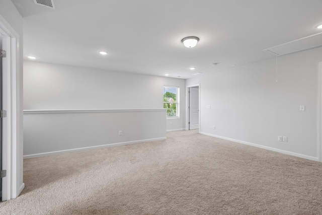 3021 Posada Ct, Spring Hill, TN 37174 - spare room featuring baseboards, carpet, attic access, and recessed lighting