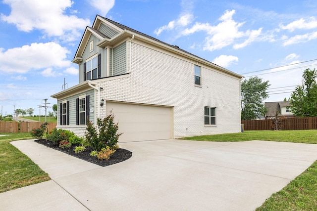 3021 Posada Ct, Spring Hill, TN 37174 - view of side of property with a yard, fence, concrete driveway, and a garage