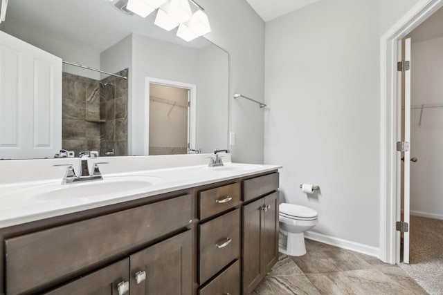 100 Bergen Dr, Spring Hill, TN 37174 - bathroom with a sink, toilet, double vanity, and a spacious closet