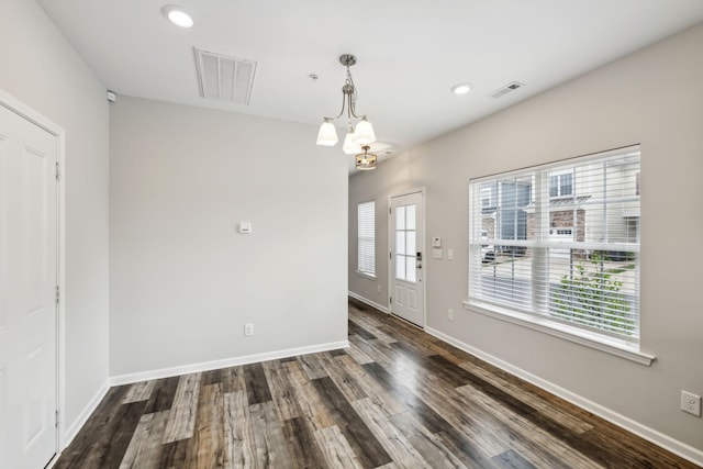 100 Bergen Dr, Spring Hill, TN 37174 - unfurnished dining area with baseboards, wood finished floors, and visible vents
