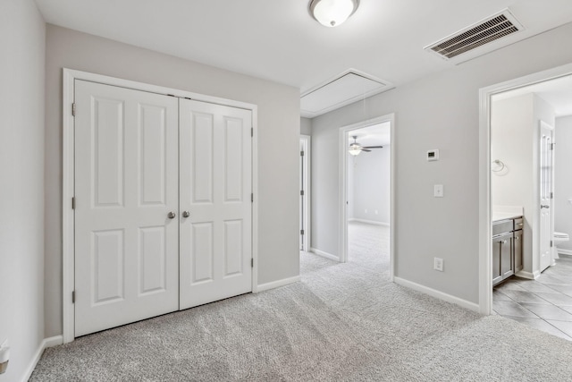 100 Bergen Dr, Spring Hill, TN 37174 - unfurnished bedroom with carpet floors, attic access, baseboards, visible vents, and a closet
