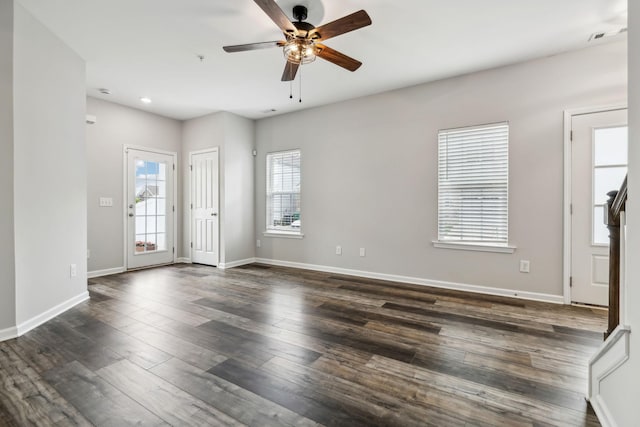 100 Bergen Dr, Spring Hill, TN 37174 - unfurnished living room with ceiling fan, visible vents, baseboards, and dark wood-type flooring