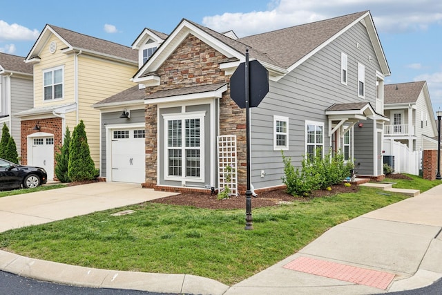 100 Bergen Dr, Spring Hill, TN 37174 - view of front of house featuring concrete driveway, roof with shingles, stone siding, and a front lawn