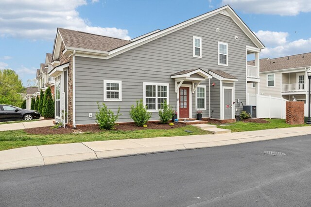 100 Bergen Dr, Spring Hill, TN 37174 - traditional-style house featuring fence, central AC unit, and a shingled roof