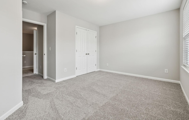 100 Bergen Dr, Spring Hill, TN 37174 - unfurnished bedroom with baseboards, carpet, and a closet