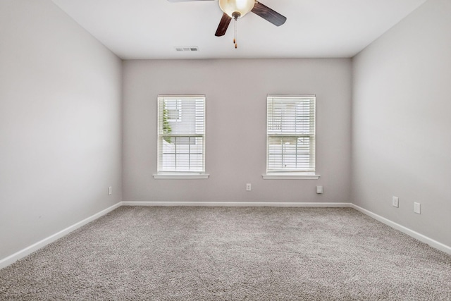 100 Bergen Dr, Spring Hill, TN 37174 - carpeted spare room with baseboards, a wealth of natural light, ceiling fan, and visible vents