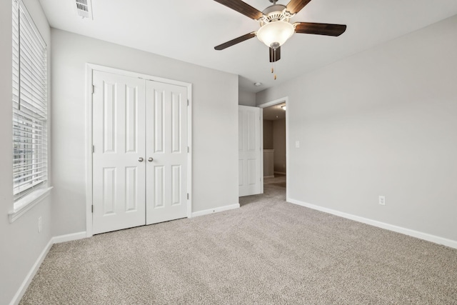 100 Bergen Dr, Spring Hill, TN 37174 - unfurnished bedroom featuring a closet, baseboards, and carpet flooring