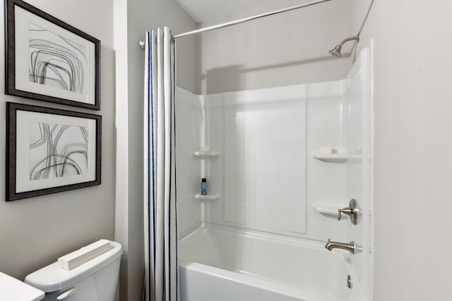full bath featuring shower / tub combo and toilet