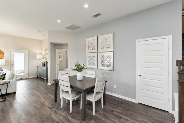 dining area with recessed lighting, baseboards, dark wood finished floors, and visible vents