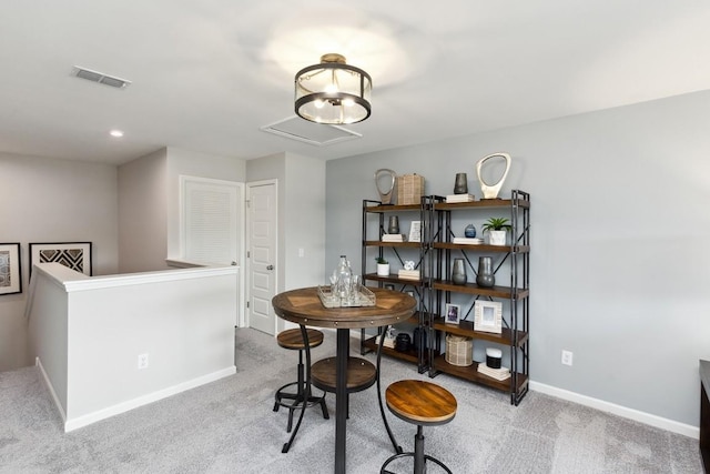 dining room featuring visible vents, carpet flooring, and baseboards