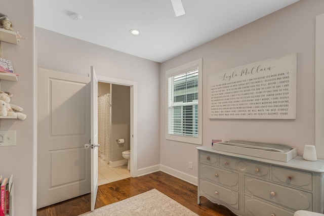 6328B Columbia Ave, Nashville, TN 37209 - bedroom with baseboards, ensuite bathroom, and dark wood-style floors