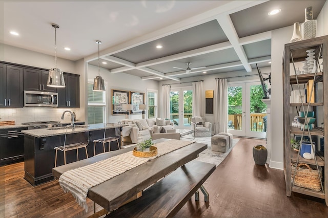 6328B Columbia Ave, Nashville, TN 37209 - dining area featuring dark wood-style flooring, a ceiling fan, recessed lighting, beamed ceiling, and coffered ceiling