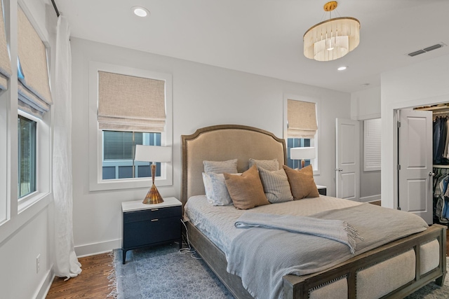 6328B Columbia Ave, Nashville, TN 37209 - bedroom featuring recessed lighting, baseboards, wood finished floors, visible vents, and a closet