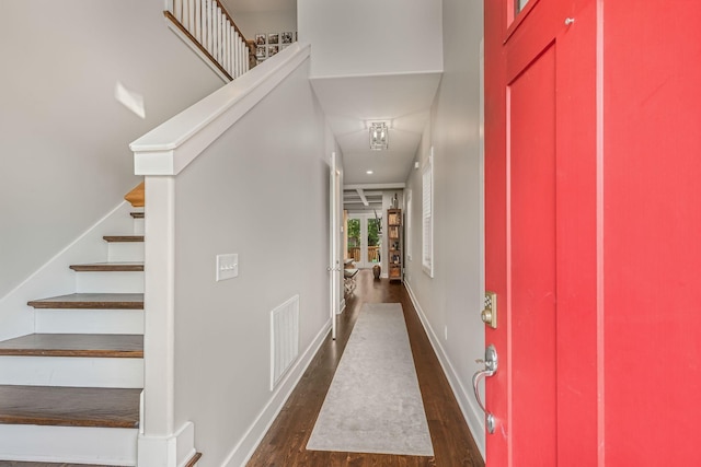 6328B Columbia Ave, Nashville, TN 37209 - entrance foyer featuring dark wood-style flooring, baseboards, visible vents, and stairway